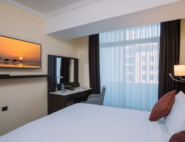 Best western plus Addis Ababa Suite room bed and TV