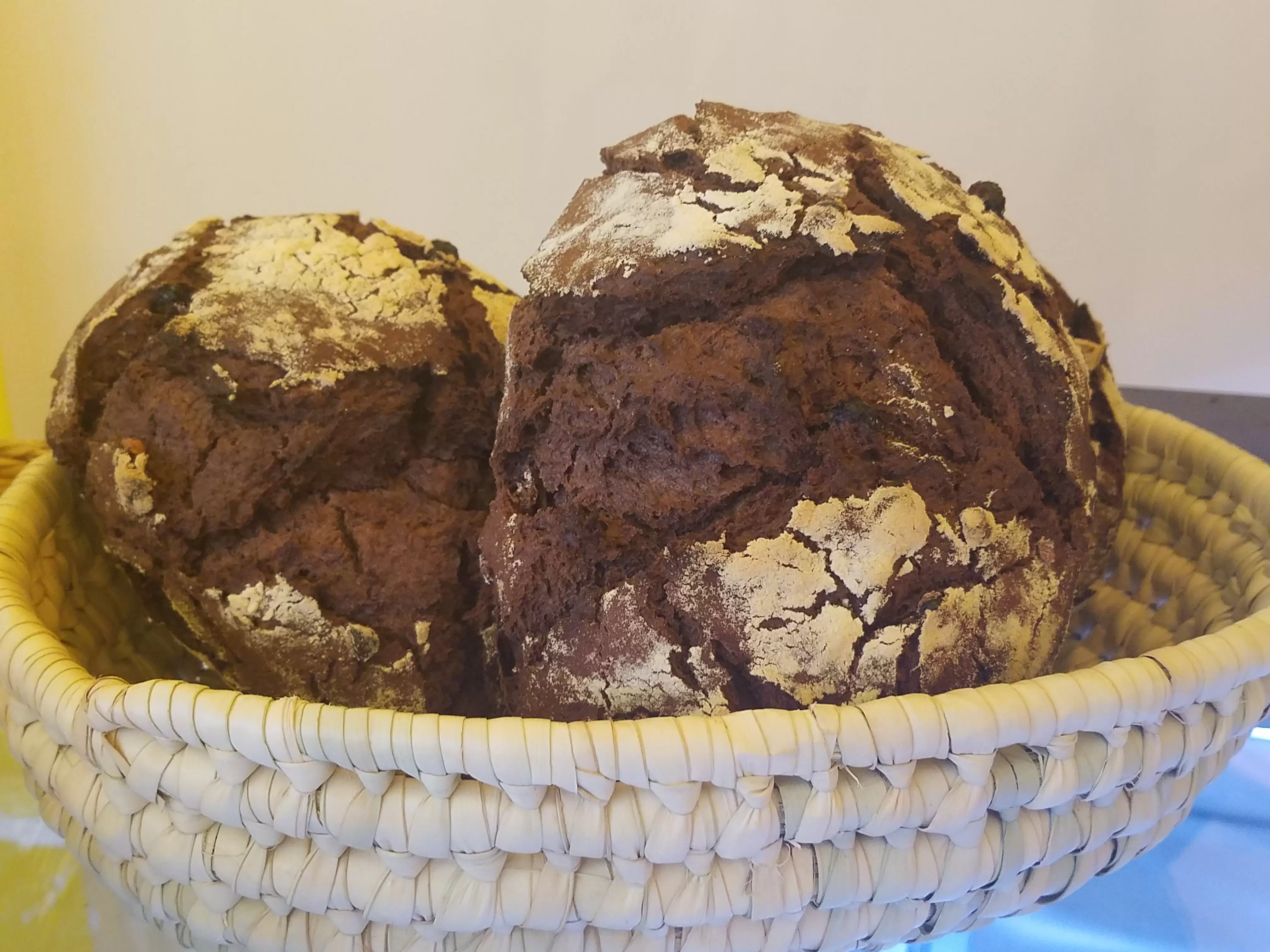 German Brown Bread sitting in a basket, whole grain bread in addis ababa