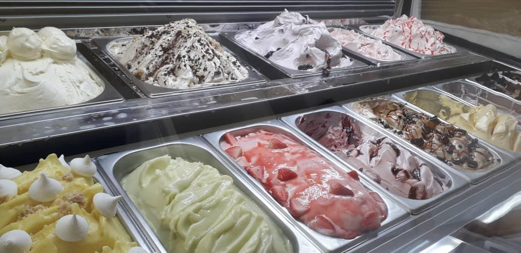 a close up picture of the 12 different flavors of gelato ice cream in addis ababa served at sweet dreams best western plus